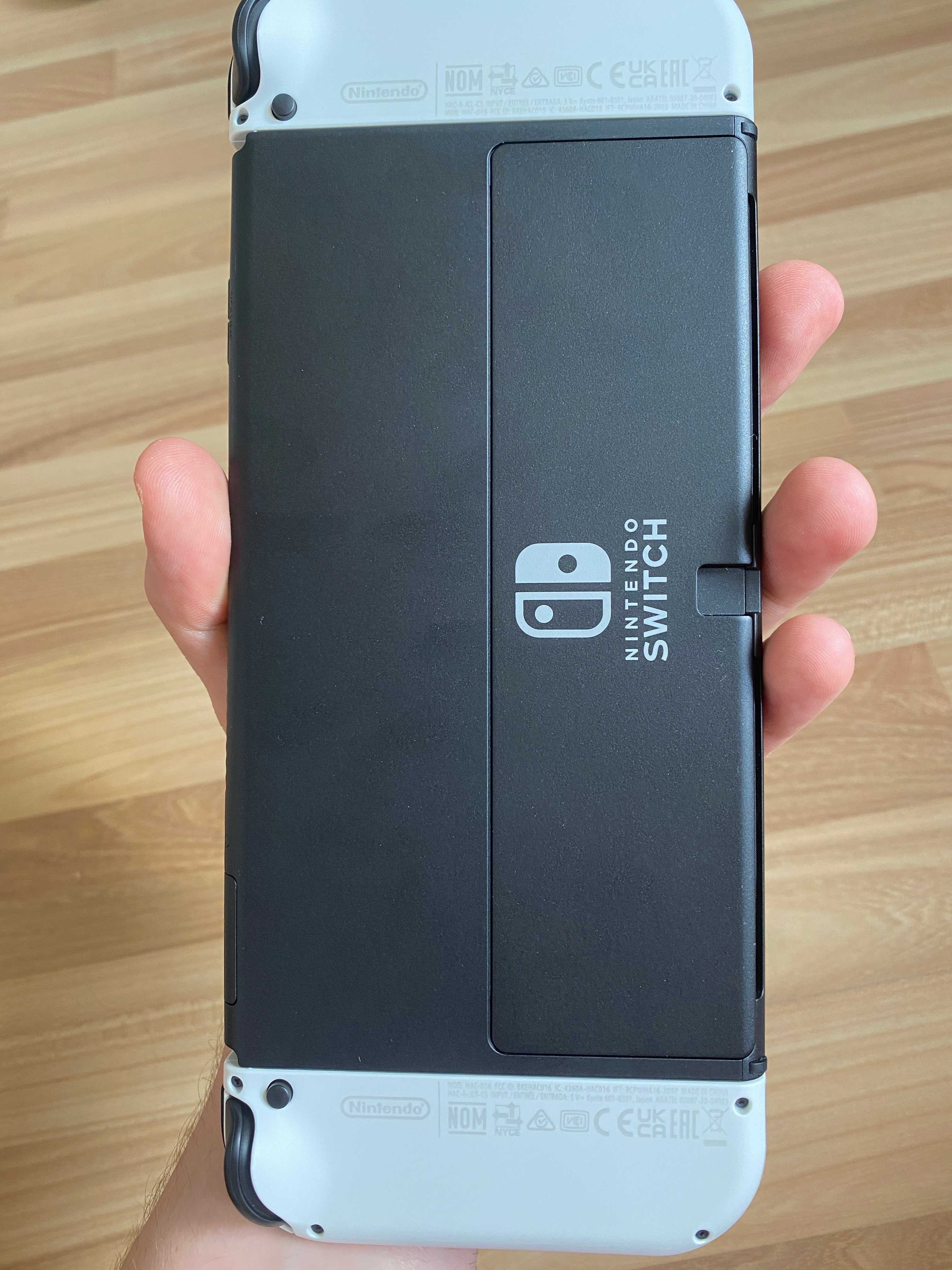 Nintendo Switch OLED + akcesoria (stan idealny), zakupione 12.2024