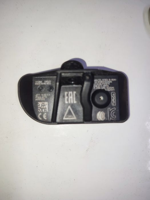 Czujnik TMPS Ford JX7T-1A180-CA oryginalny 4 szt