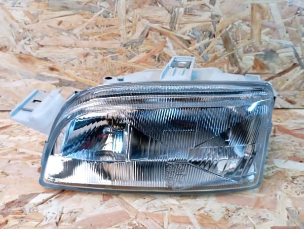 Ótica / farol esquerda FIAT Punto (176_)
