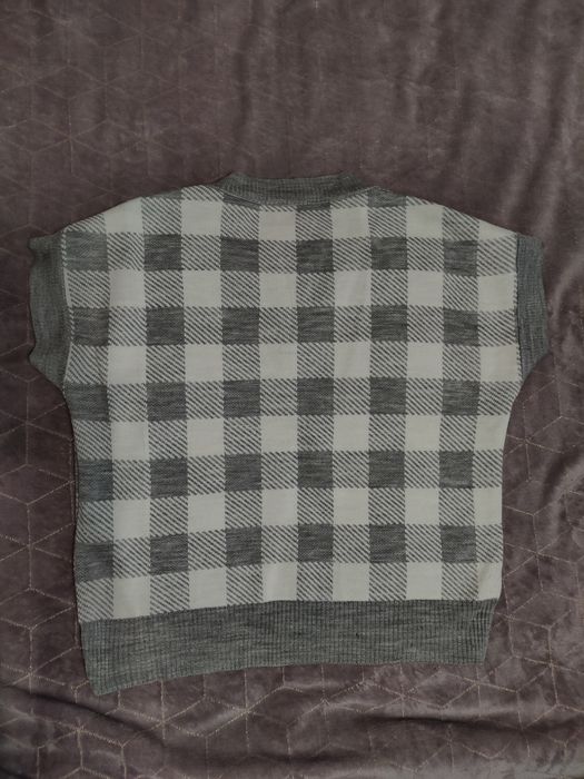 Жилетка в клітинку