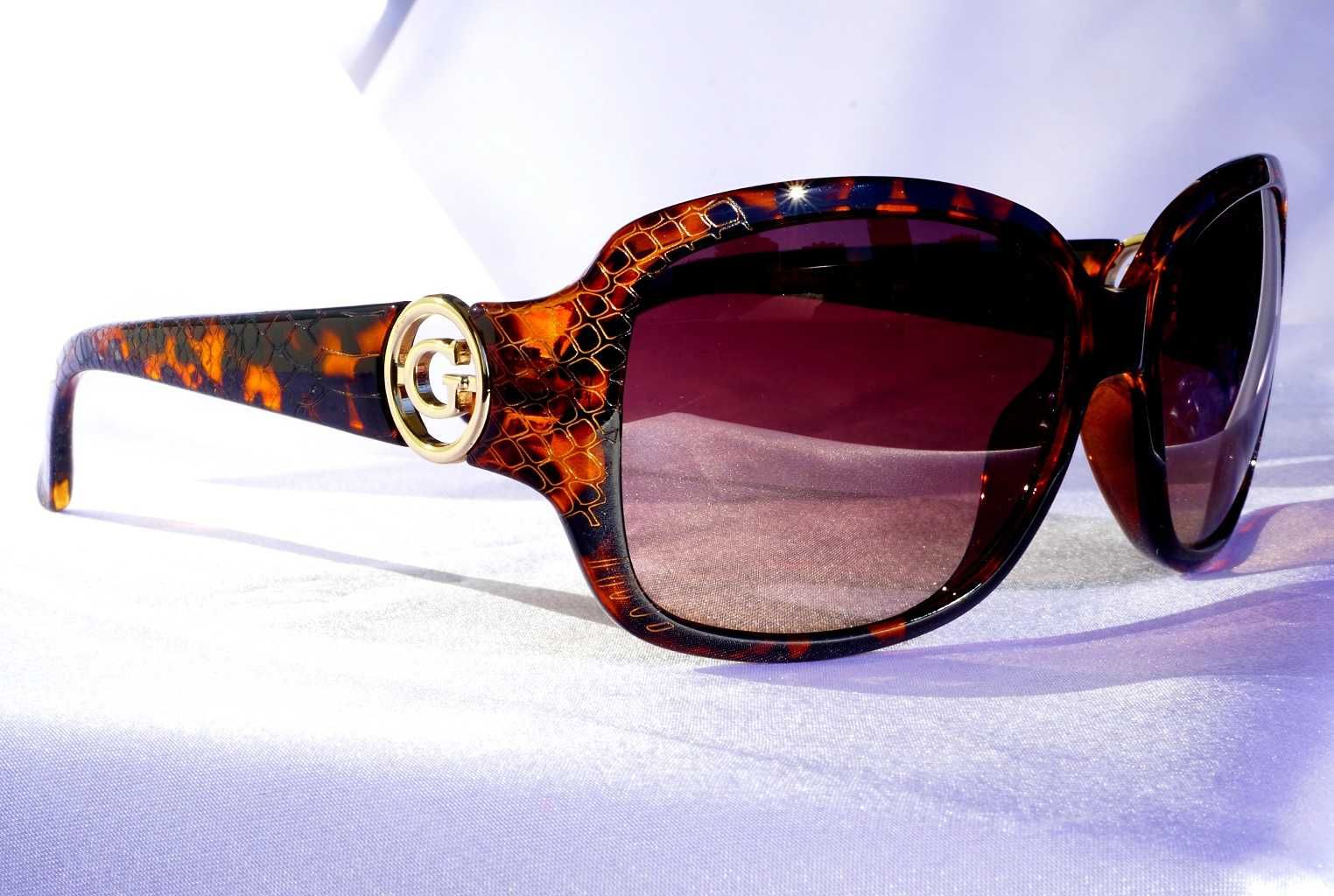 Okulary słoneczne Guess GU7310  bursztunowe skóra węża sunglasses
