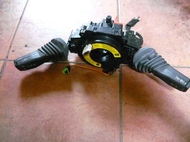 Opel Astra J przełącznik pod kierownice