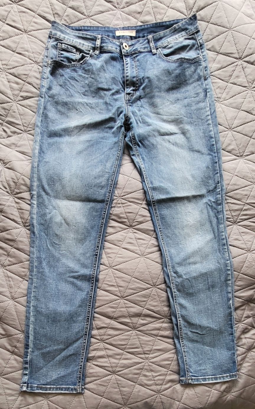 Spodnie jeansowe damskie Karostar rozm. 46