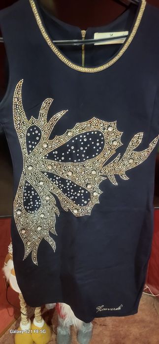 Женское очень нарядное платье .