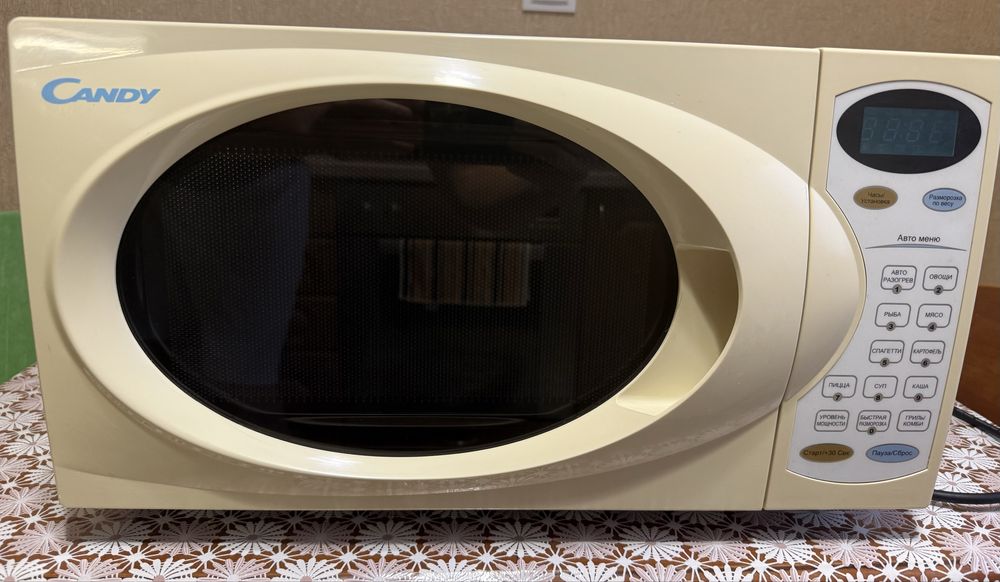 Мікрохвильова піч Candy