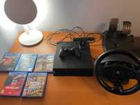 Playstation 4 + pad Dualshock 4+ kamera+5 gier + kierownica z pedałami