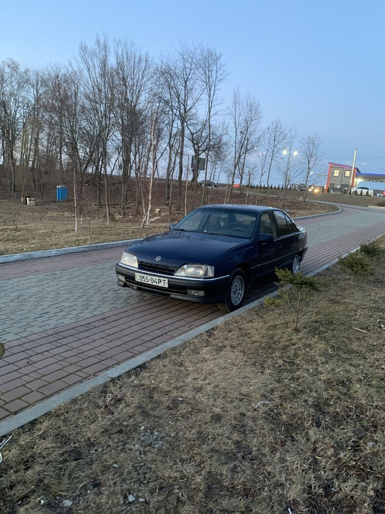 Opel Omega A. Газ/Бензин