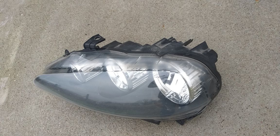 Alfa Romeo 147 lift lampa przednia lewa oryginał