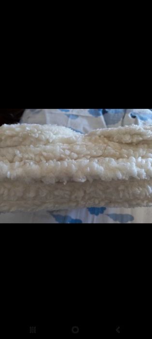 Almofada para pés, de lã, com magneto-terapia.