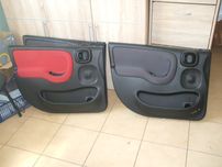 Tapicerka drzwi przednia lewa różna Fiat Panda III