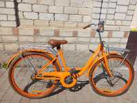 Продам оригінальний велосипед Дорожник помаранчевого кольору з чеською