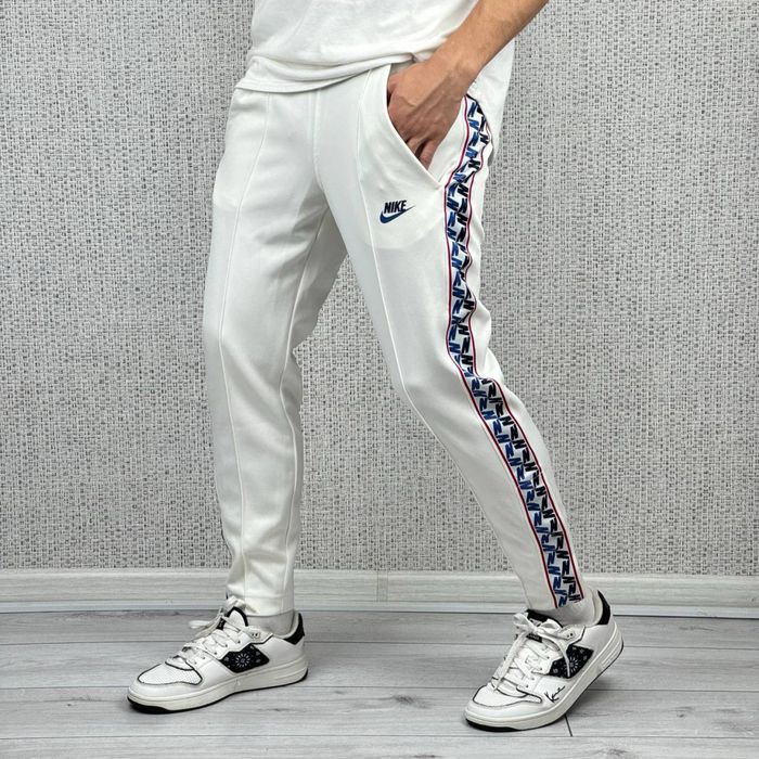 Спортивные штаны Nike Taped Pants спортивні штани найк теч фліс tech