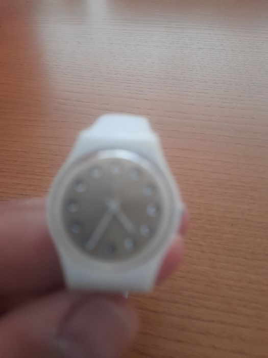 Relogio como novo de mulher marca  swatch.