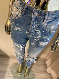 Zara genialne jeansy z dziurami łatkami farba cudo M