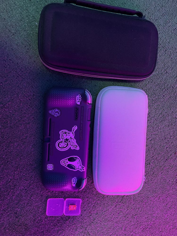 Vendo nintendo switch lite com acessorios/ troco