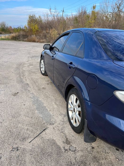 Мазда 6 2,3 Газ бензин 2004 год