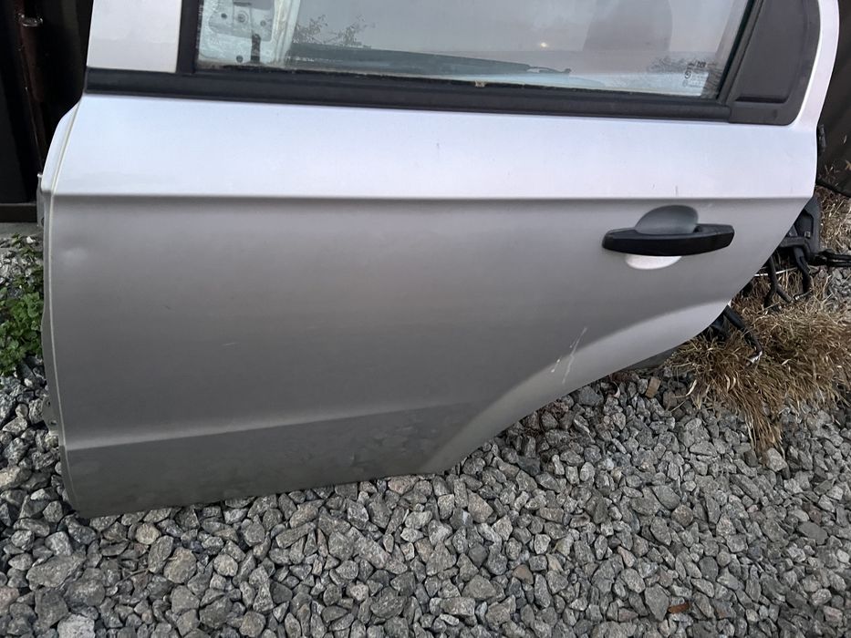 Двері передні задні Chevrolrt Aveo T250 Шевроле Авео Т250
