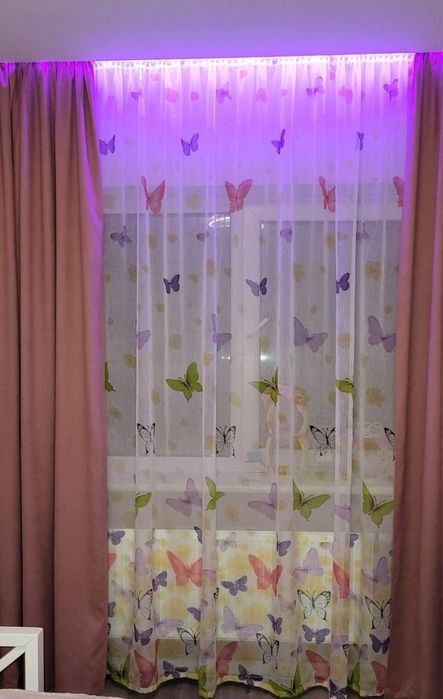 Тюль в ніжні метелики