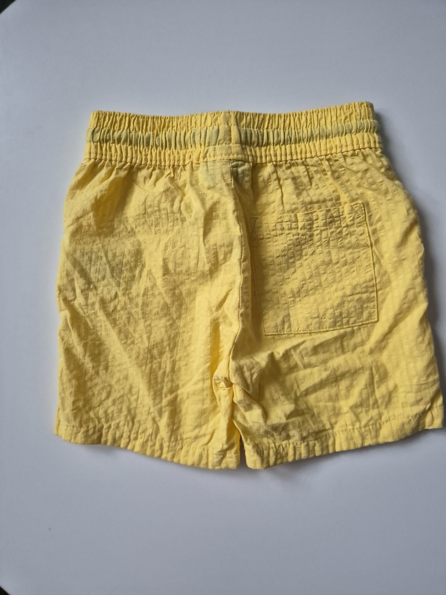 Szorty krótkie spodenki Lupilu 98/104 używane żółte