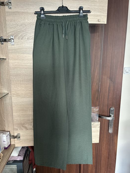 Luźne spodnie szerokie khaki dzwony luźna nogawka