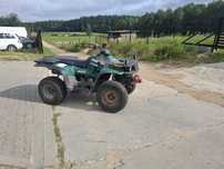 Quad Polaris Magnun 325 4x4  z wciągarką i pługiem.