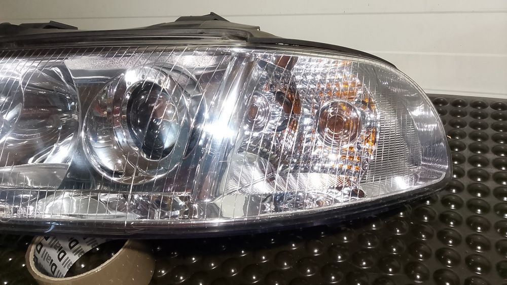 Lampa przód Audi A4 B5 lift Lewa jak nowa TYC