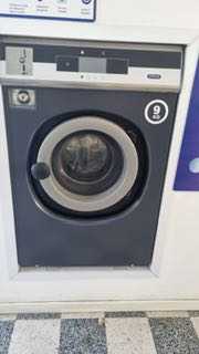 Máquinas industriais de lavandaria