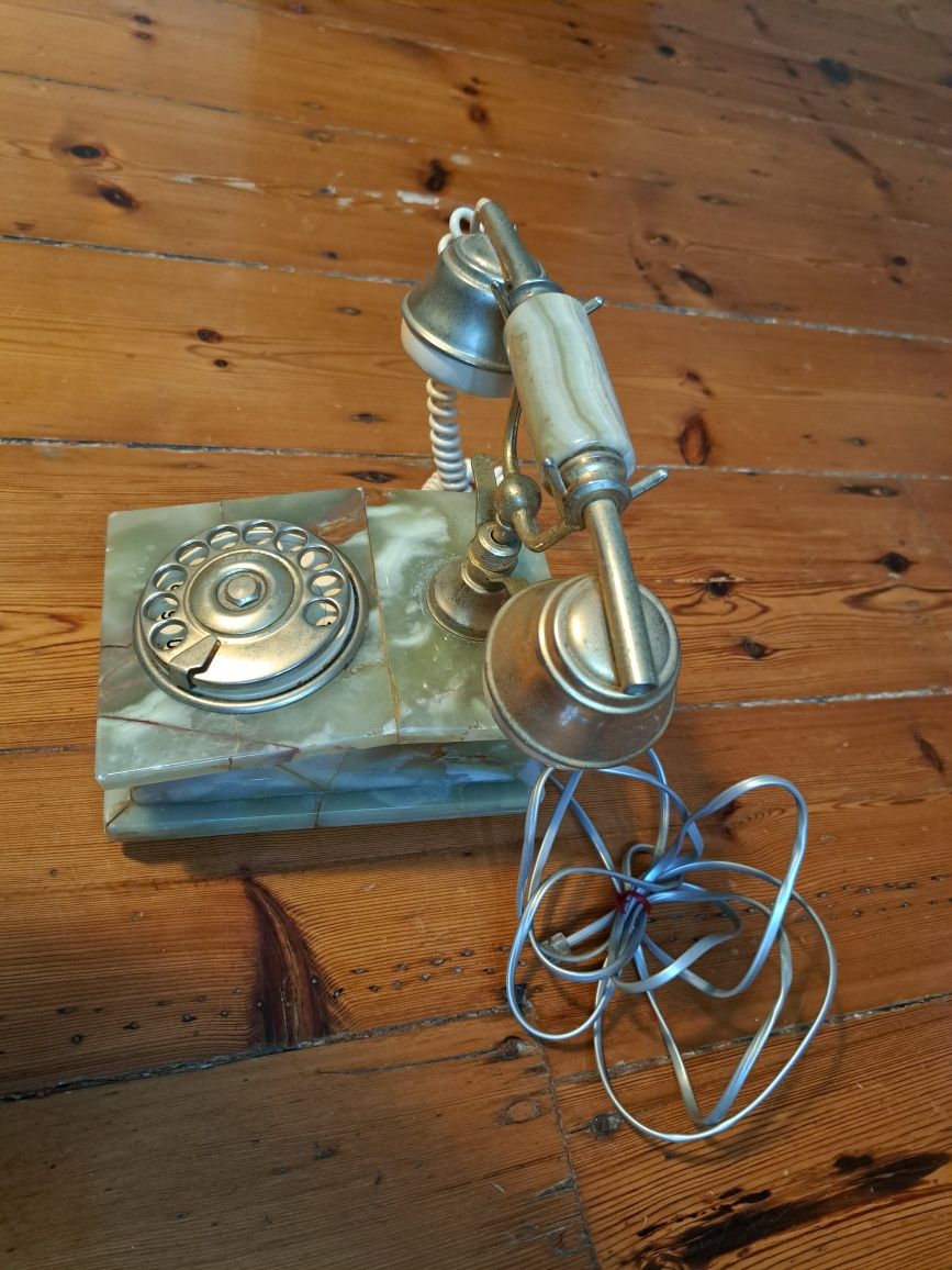 Telefone antigo em marmore e metal dourado