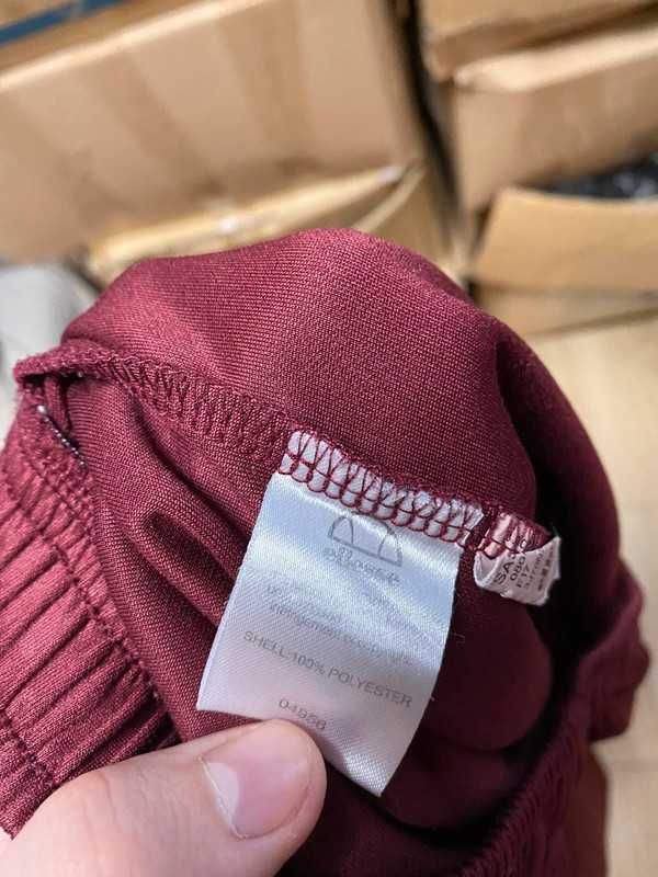 Damskie spodnie z szerokimi nogawkami Ellesse