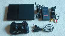 Konsola Playstation 2 z kontrolerem i okablowaniem