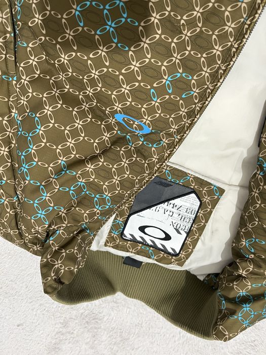 Oakley r. XL meska puchowa kamizelka brazowa khaki turkusowa