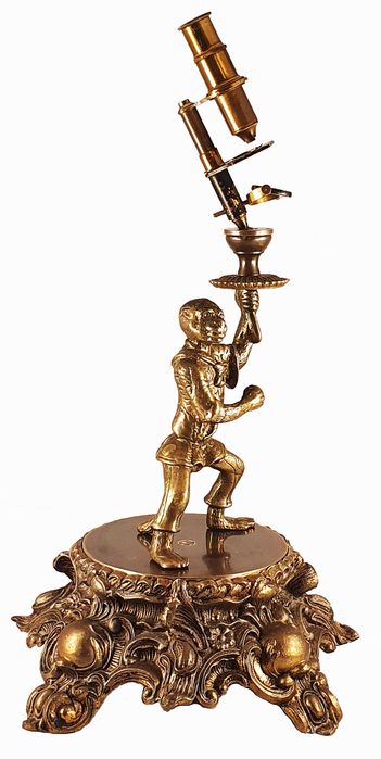 Brass reproduction of a “monkey microscope”