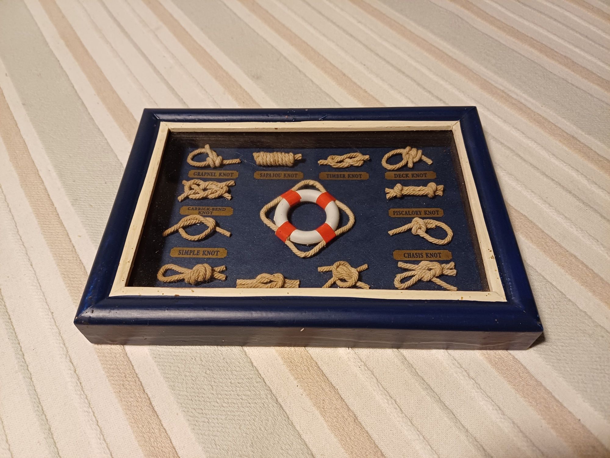 Quadro de nós de marinheiro com moldura azul