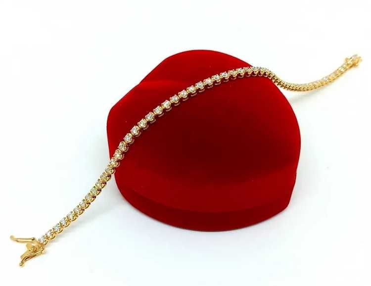 Złota bransoletka tenisówka z diamentami 1,18ct Pr.585 W:5,14gr 18cm