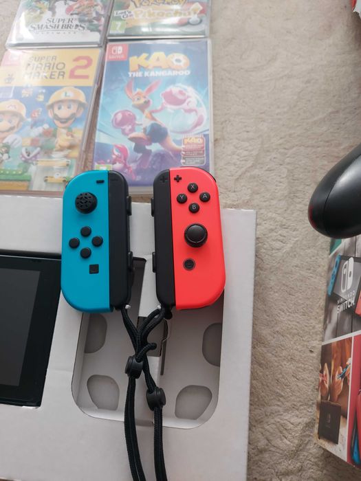 Nitendo switch plus 4 gry