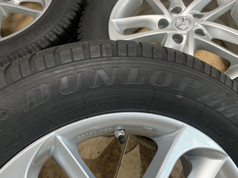 Комплект дисків R16 5/114.3 ET55 6.5JJ*16FH з шинами 205/60/16 DUNLOP