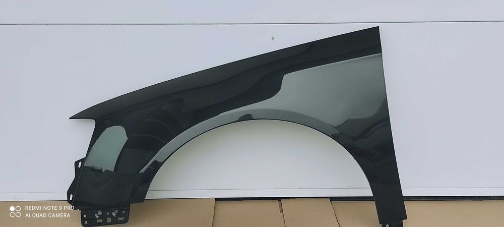 błotnik przedni lewy vw passat b6 kod lc8z brązowy 05-10 nowy kurier