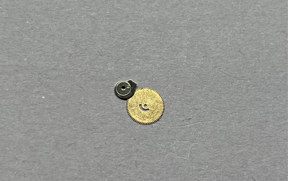 Omega 1002 Seamaster DeVille przerzutnik daty, koło