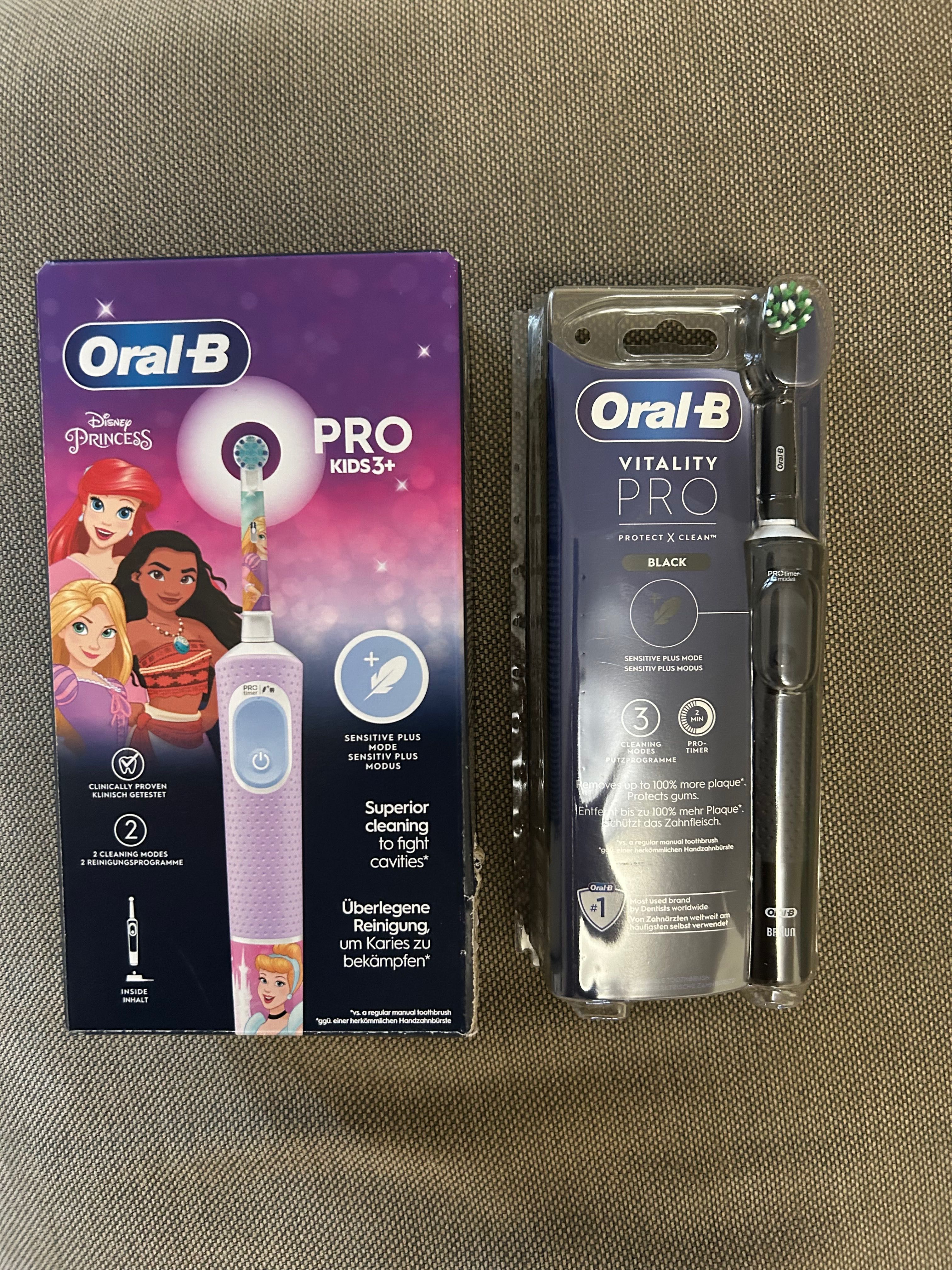 2 conjuntos de escovas elétricas Oral B Pro (adulto) e criança.