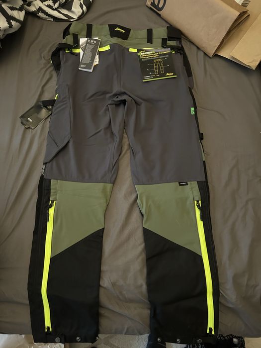 Spodnie Robocze BHP SoftShell Stretch kieszenie Snickers 6940 Oliwkowe