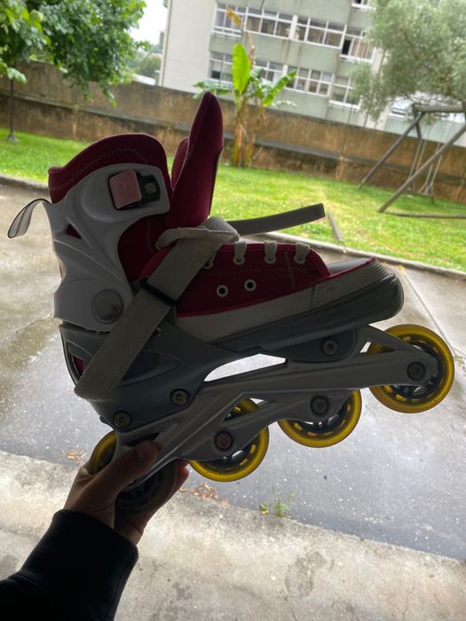 Patins em linha rosa e choc vi