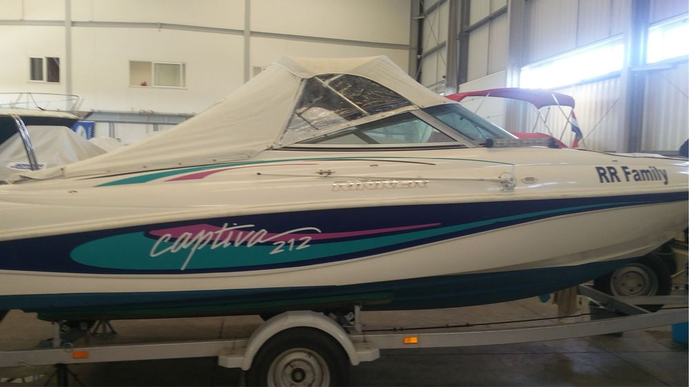 Barco bow rider Rinker Captiva 212 proa aberta, reboque, aceito retoma