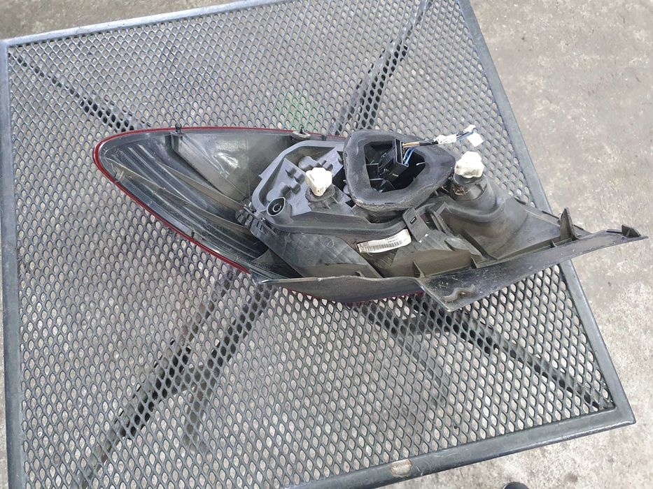 Lampa tył tylna lewa Opel Corsa D 5 drzwi europejska