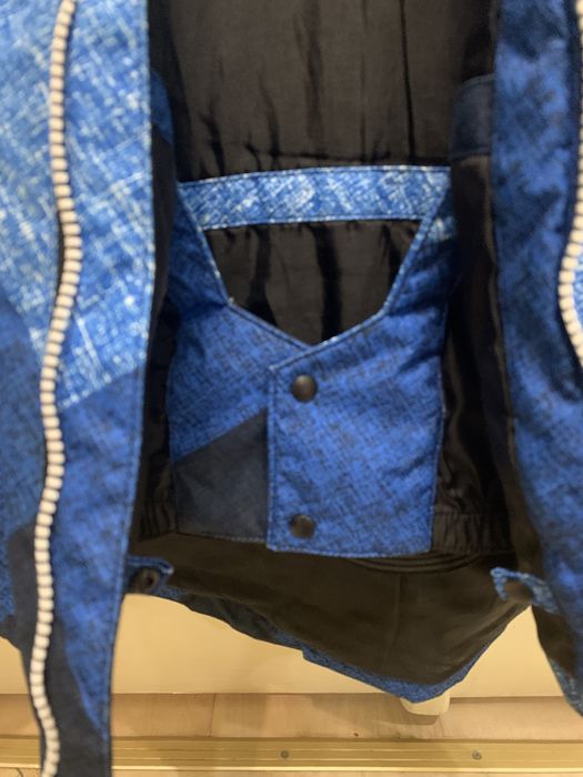 Продам зимову куртку Reima на ріст 140-146 см