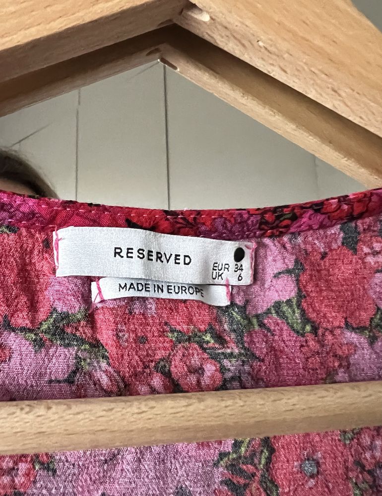Kwiecista długa sukienka Reserved