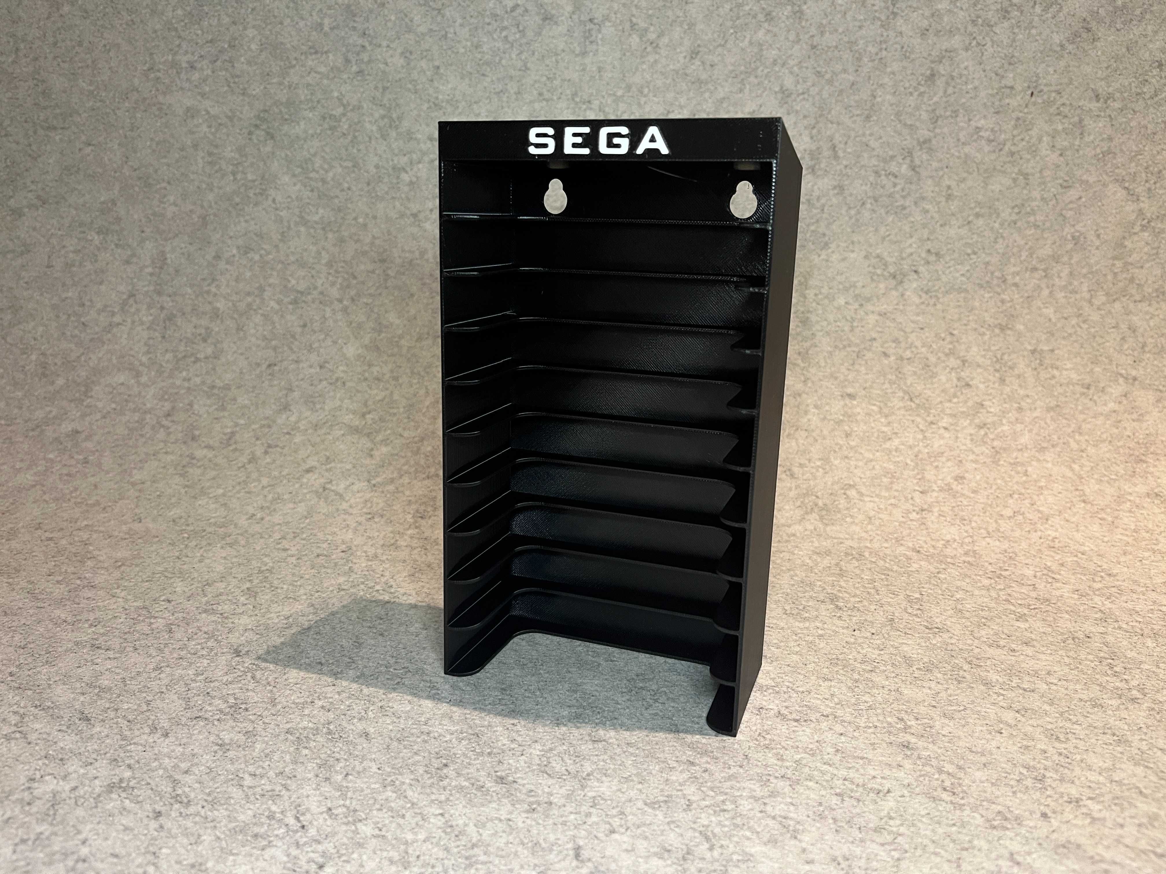 Stojak / wieszak scienny na gry Sega Megadrive / Master System