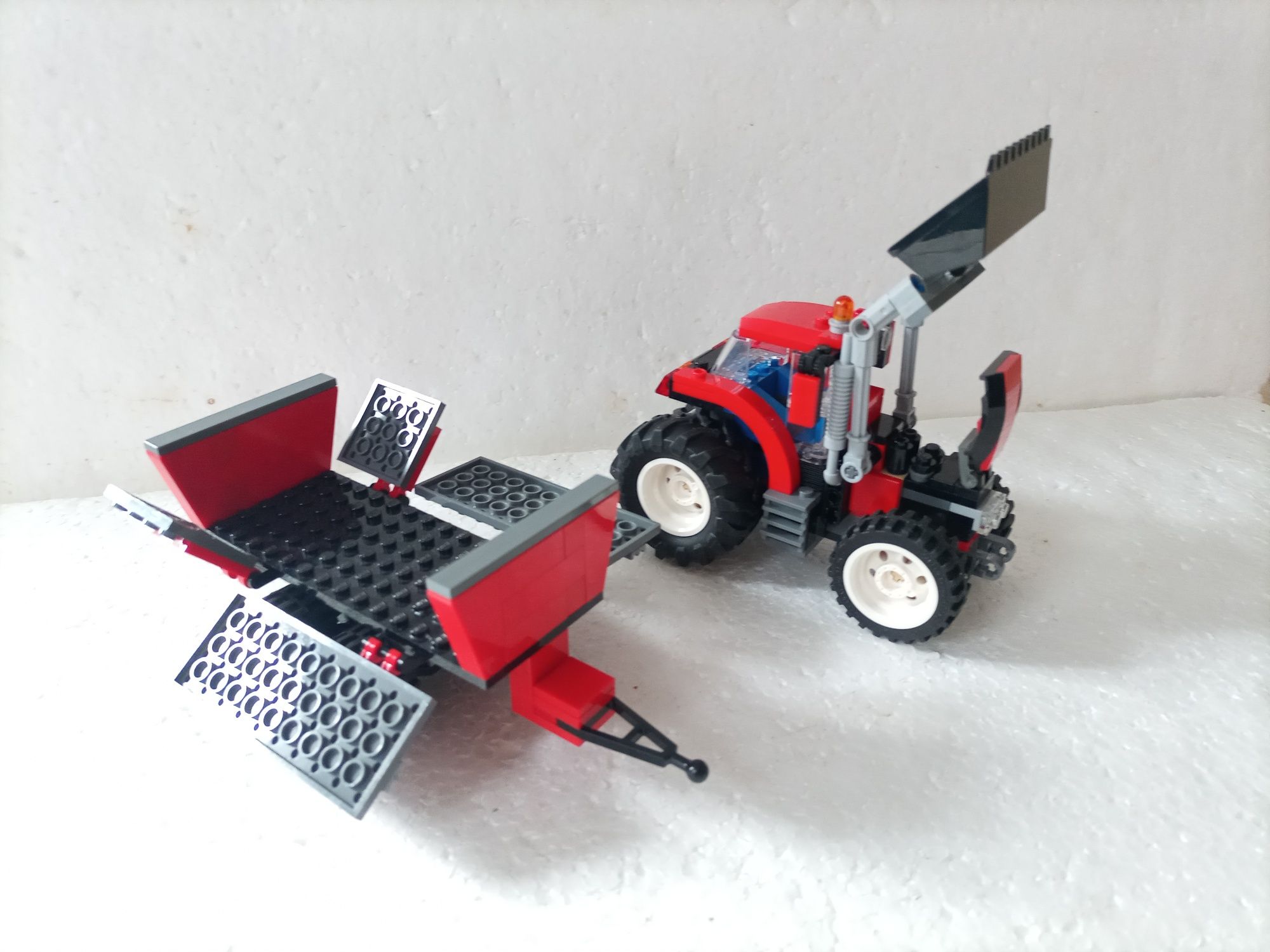 Klocki LEGO traktor przyczepa farma