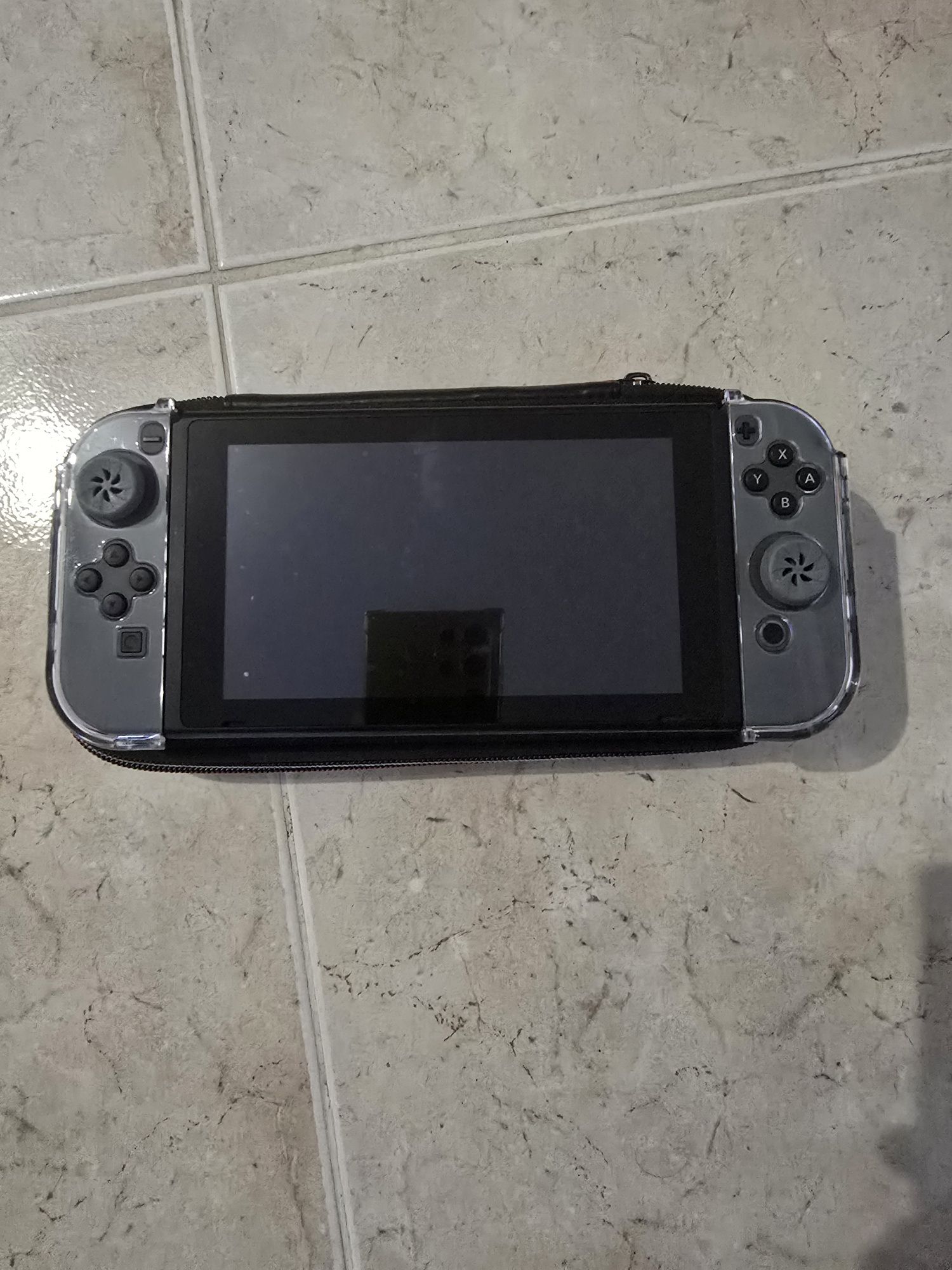 Nintendo Switch V2 cinza com bolsa