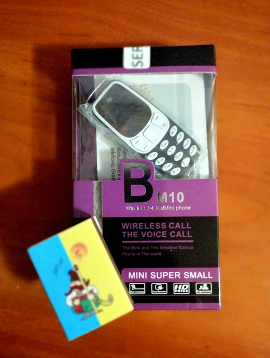 Малюк міні телефон.