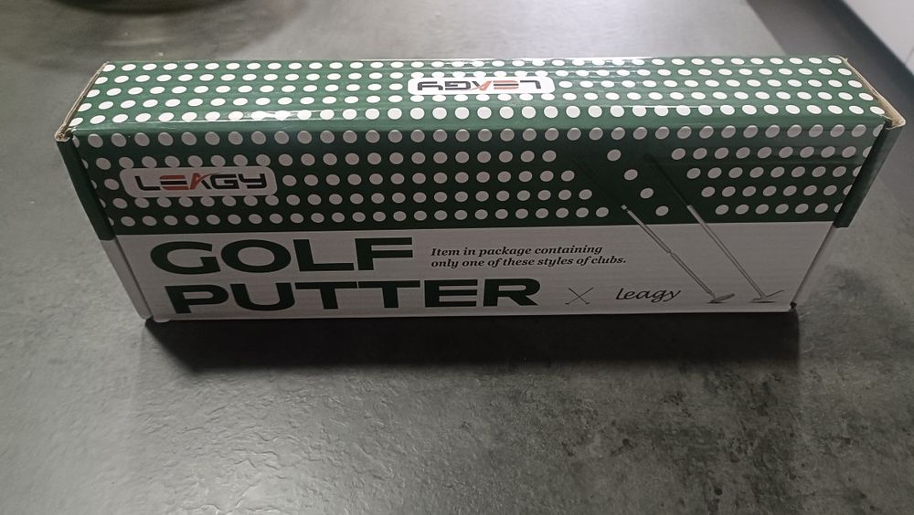 Taco de golfe e bolas